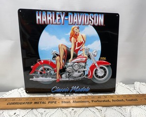 lot 373 image: Tin Sign- Harley Davidson 1956