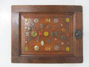 lot 52 image: Antique Folk Art Display wOld Metal Tobacco Tags