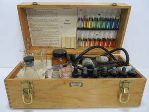 lot 57 image: Vintage Chemical Science Experiment Kit wDovetailed Wood Case