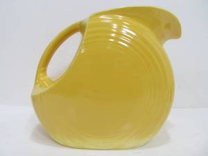 lot 72 image: Vintage FIESTA Yellow Disc Pitcher