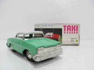 lot 300 image: Vintage Classic Taxi with Friction and Siren Toy in Original Box