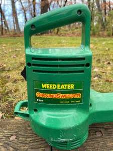 lot 107 image: Electric Weedeater Ground Sweeper Model 2510