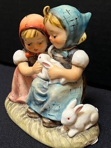 lot 200 image: Two Hummel Figurines Hummel Playmates 56 and Hummel Easter Time 384