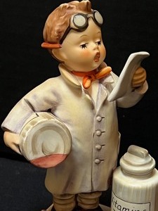 lot 202 image: Hummel Figurine The Little Pharmacist 322
