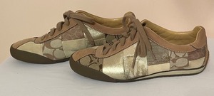 lot 397 image: Two Pairs of Womens Coach Shoes