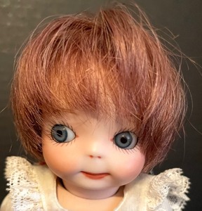 lot 412 image: Adorable Flirty Eyed Doll (Reproduction)