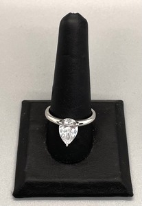 lot 31 image: Sterling Silver Ring with Teardrop Shaped Cubic Zirconia Stone