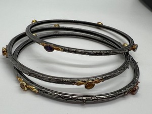 lot 87 image: Three Sterling Silver & Multi Stone Bangle Bracelets