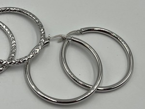 lot 94 image: Two Pairs of Sterling Hoop Earrings