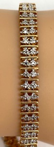 lot 179 image: Simple and Elegant Sterling Silver Gold Plated Bracelet with Diamond Chips