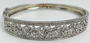 lot 236 image: Sterling Silver Hinged Bracelet with Diamond Like Accents