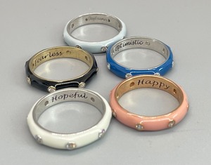 lot 186 image: Vintage Sterling Silver, Enamel, and Cubic Zirconia Stackable Rings with Inlaid Inspirational Words