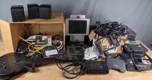lot 178 image: Assortment of Yealink Office Phones, Tandberg Video Conference Phone, Guitar Hero Guitar, Speakers, & More R