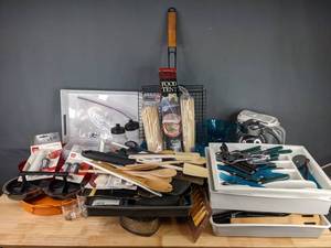 lot 204 image: A Variety of Kitchen Items Including Silverware, Kitchen Utensils, Shot Glasses, Bowls, Serving Trays, Pitchers and More  H