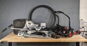 lot 188 image: Longfei Scooter, Size 11 CCM Ice Skates, 15x6.00-6 NHS Tire with Rim, Bicycle Tires, Knee Brace and Bell Trunk Bike Rack  R