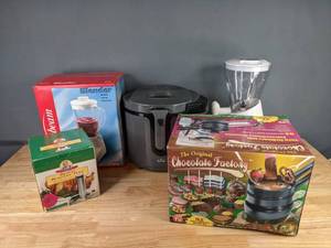 lot 214 image: Sunbeam 6-Speed Blender, The Original Chocolate Factory, Back to Basics Smoothie Jr. Blender, Rival Deep Fryer, The Holland Grill Brads Roastin Post H