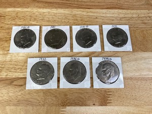 lot 137A image: Seven Eisenhower Liberty Dollar Coins K
