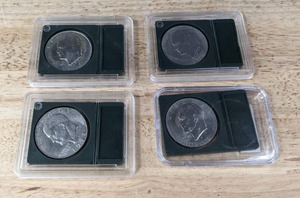 lot 50 image: Set of (4) Eisenhower Liberty Dollar Coins 1972, 1978, & 1776-1976 K