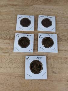 lot 126 image: Two 2000D Minted, One 2000P, and Two 2001D Sacagawea Dollar Coins K