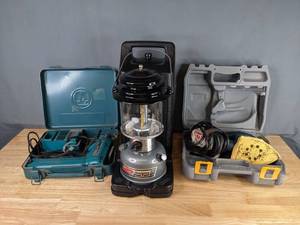 lot 293 image: Ryobi Corner Cat Sander, Coleman Dual Fuel Lantern, and Makita Cordless Drill M