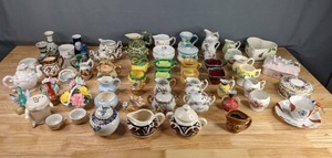 lot 270 image: Lot of 64 Small Pitchers, Bowls, Creamers, Sugar Bowls and More    M