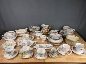 lot 246 image: Collection of 54 China Teacups and Saucers, Pitcher, Plates, Gravy Boat, Serving Dishes and More From Several Patterns (Royal Albert, Lefton, Pope Gosser) M