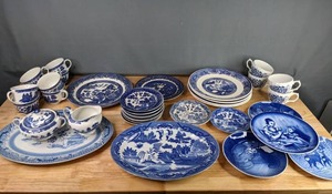 lot 243 image: Collection of 37 Blue and White China Dishes, Cups and Serving Pieces by B & G, Bareuther, House of Blue Willow, Churchill, and Emerald M
