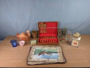 lot 288 image: Kitchen Items and Decor - Silverware Set, Fish Placemats, Vintage Shirley Temple Blue Creamer, Cardew Design Teapot, and more M
