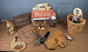 lot 256 image: Wicker Basket, Wire Basket, Welcome to The Country Sign, Ceramic Pheasant, Giovanni Collection Bear Tabletop Sculpture, Rams Horn and More M