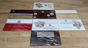 lot 88A image: The United States Mint 1984, 1985, 1986, 1987, 1988, 1989, 1992, and 1996 Uncirculated Coin Sets K