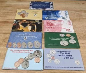 lot 86A image: The United States Mint 1990, 1991, 1993, 1994, 1995, 1997, 1998, (2) 1999 Uncirculated Coin Sets K