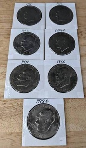 lot 139 image: Seven Eisenhower Liberty Dollar Coins K
