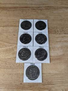 lot 133 image: Assortment of Seven Eisenhower Liberty Dollar Coins K