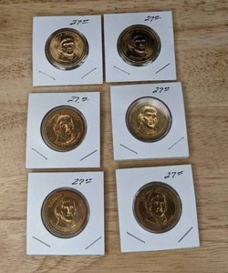 lot 87 image: Set of (6) 2007 Thomas Jefferson Presidential Golden Dollar Coins K