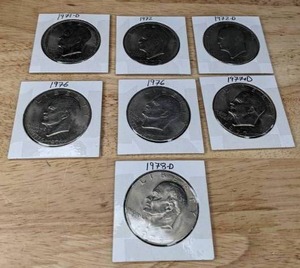 lot 138 image: Seven Eisenhower Liberty Dollar Coins K