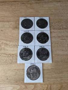lot 135 image: Collection of Seven Eisenhower Liberty Dollar Coins K