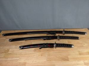 lot 712 image: Set of Three Japanese Katanas with Sheaths  M