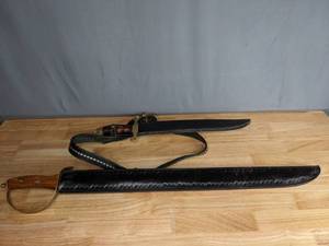 lot 717 image: Belt with a Knife and Stainless Sword with Sheaths  M