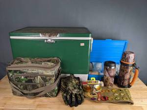 lot 722 image: Large Coleman Cooler, High Performance Polarized Fishing Glasses, Thermos Bottle, SubZero Camo Lunch Bag Cooler, Camo Gloves and More M