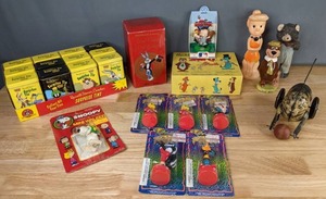 lot 701 image: Vintage Toys  Rare Thirsty Bear, Wilma Flintstone, Yogi Bear, Looney Tunes Tins and Figures (MLB), Huckleberry Hound Spin-O Game, Antique 1920s Tin Cat Toy, and More  M