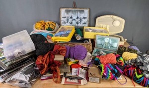 lot 704 image: Huge Assortment of Sewing Supplies, Sewing Baskets, Yarn, Crafting Supplies, Cross Stitch Kits, and Much More  M