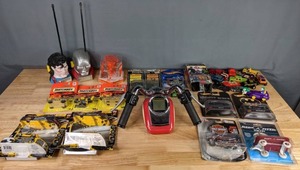 lot 705 image: Toy Lot Vintage DC Superman & Steel Walkie Talkies, Harley Davidson Road Rally Game, Hot Wheels, Matchbox, Batman, Knight Rider, Ultron, and More  M