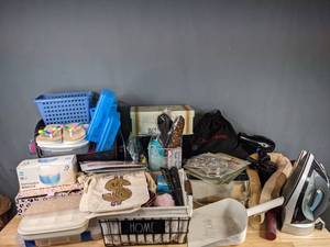 lot 295 image: Miscellaneous Home Items - Hair Dryers (Conair, Andis), Hamilton Beach Iron, Pharmacopia Hotel Toiletries, Beauty Products, Glass Scale, Small Plastic Bins, and more M