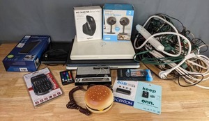 lot 742 image: Power Strip Extension Cords, Dell PP22L Laptop, Apple Laptop, Logitech MX Master 3 For Mac Advanced Wireless Mouse, Merkury Innovations Smart Wi-Fi Indoor Camera, iPhone Charging Cable, Indoor Antenna, 56-Function Scientific Calculator and More M