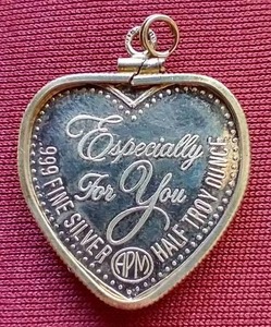 lot 8 image: 12 Oz Silver Heart Pendant