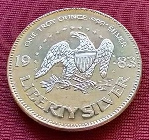 lot 22 image: 1 Oz. Liberty Silver Round