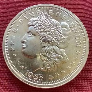 lot 56 image: 1985 1 Oz. Silver Round