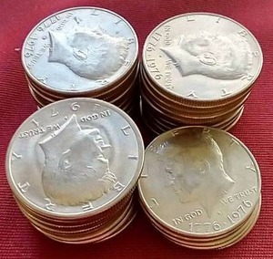 lot 57 image: (35) Kennedy Half Dollars