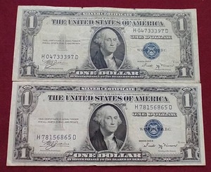lot 119 image: (2) Silver Certificate $1 Notes (1935 Series)