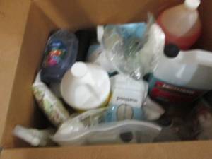 box of cleaning chemicals and soaps...